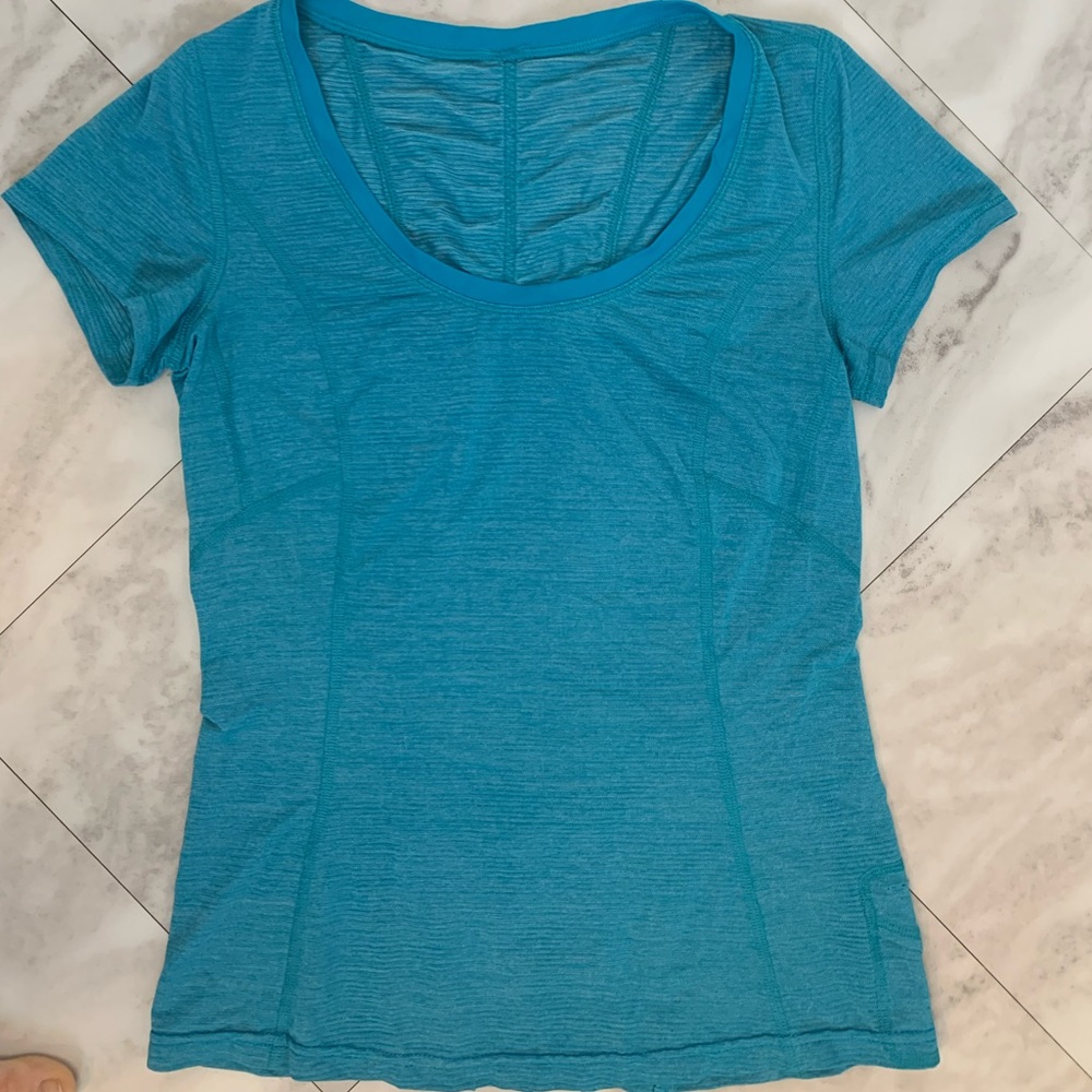 Bright blue Lululemon workout t-shirt